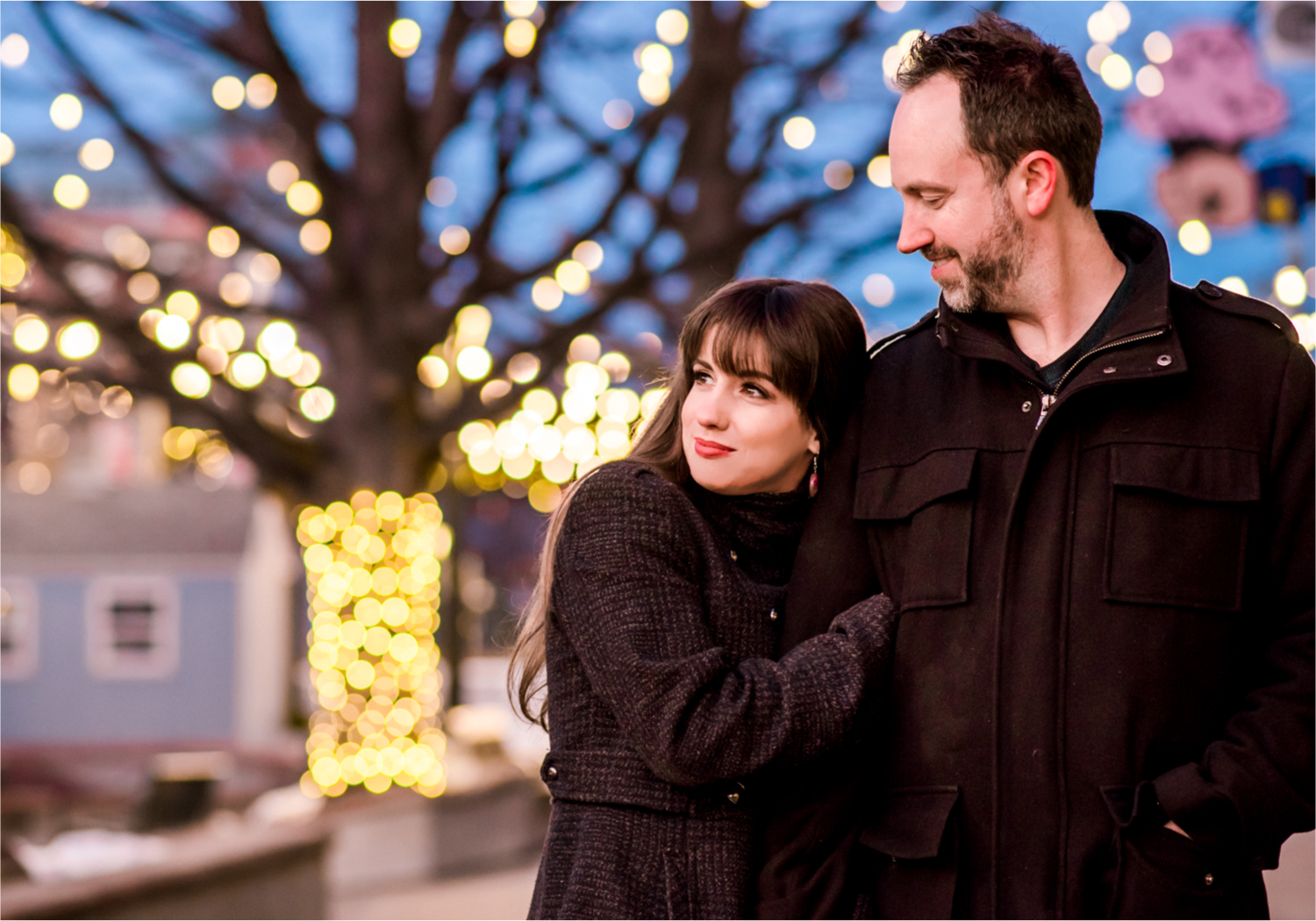 Snowy Winter Engagement in Old Town Fort Collins with twinkle lights | Britni Girard Photography, Colorado Wedding Photographer
