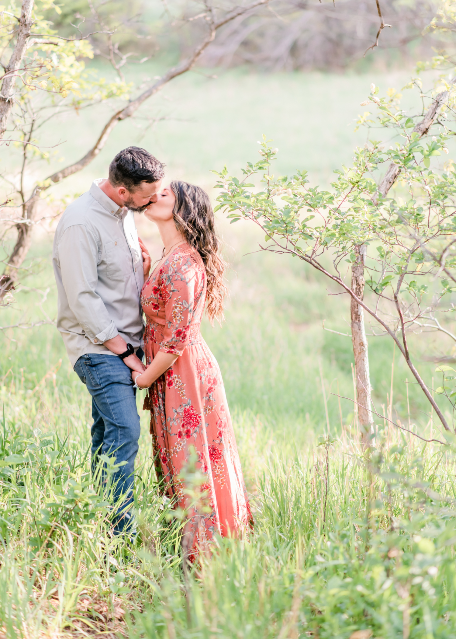 Romantic Summer Engagement at Red Rock Canyon Park in Colorado Springs | Britni Girard Photography Colorado Wedding Photographer and Videographer | Floral Dress, Green Dress, Grassy Fields, Rustic Boho Engagement