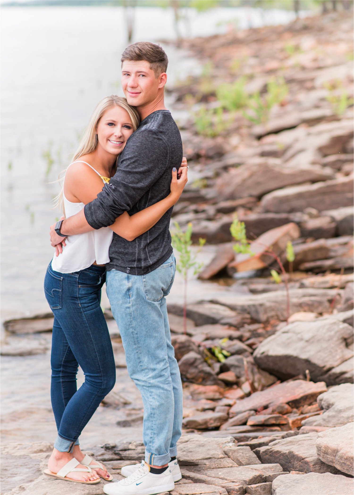 Romantic Summer engagement Lakeside at Carter Lake | Britni Girard Photography, Colorado Wedding Photographer | Walks down by the water and dancing on the dock during casual engagement in Loveland Colorado