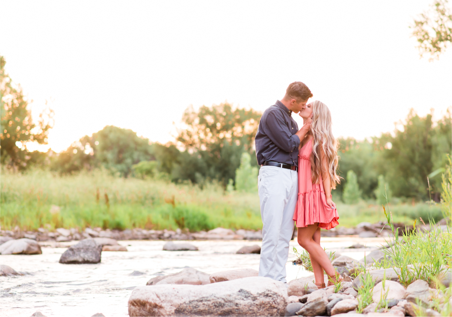 Romantic Winery engagement at Sweet Heart Winery in Loveland  | Britni Girard Photography, Colorado Wedding Photographer | Strolls along the Big Thompson River at Sunset, toasting their engagement with Sweet Heart Wine and dancing in the field during sunset