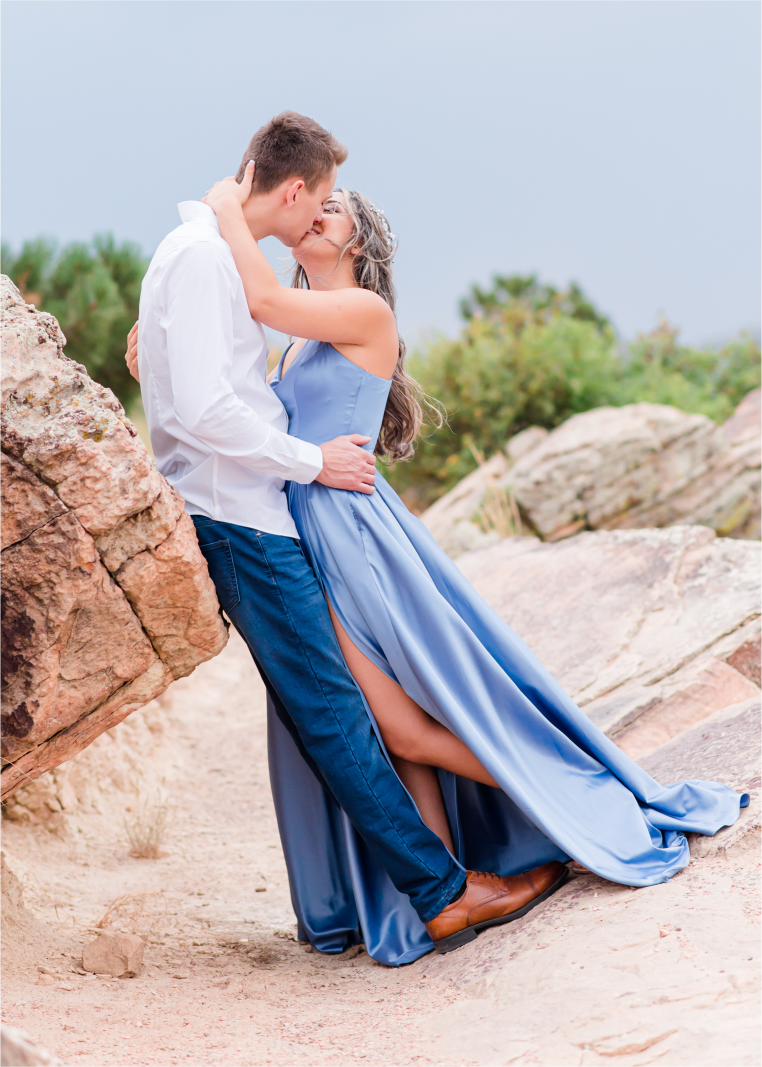 Romantic and Playful Summer engagement session at Horsetooth Reservoir in Fort Collins Colorado | Britni Girard Photographer | Wedding photographer and videographer team | Stormy and Windy Engagement on the cliffs of Horsetooth | Rotary Park