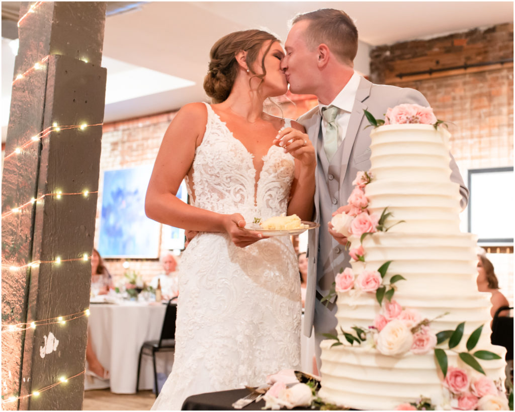 Candlelit Reception at The Warehouse in Colorado Springs | Britni Girard Photography | Colorado Wedding Photo and Video Team | Flowers by A Wildflower Florist | Cake by Icing on the Cake