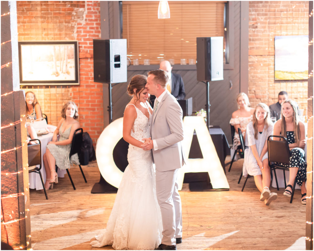 Candlelit Reception at The Warehouse in Colorado Springs | Britni Girard Photography | Colorado Wedding Photo and Video Team | Flowers by A Wildflower Florist | DJ Jay Kacik