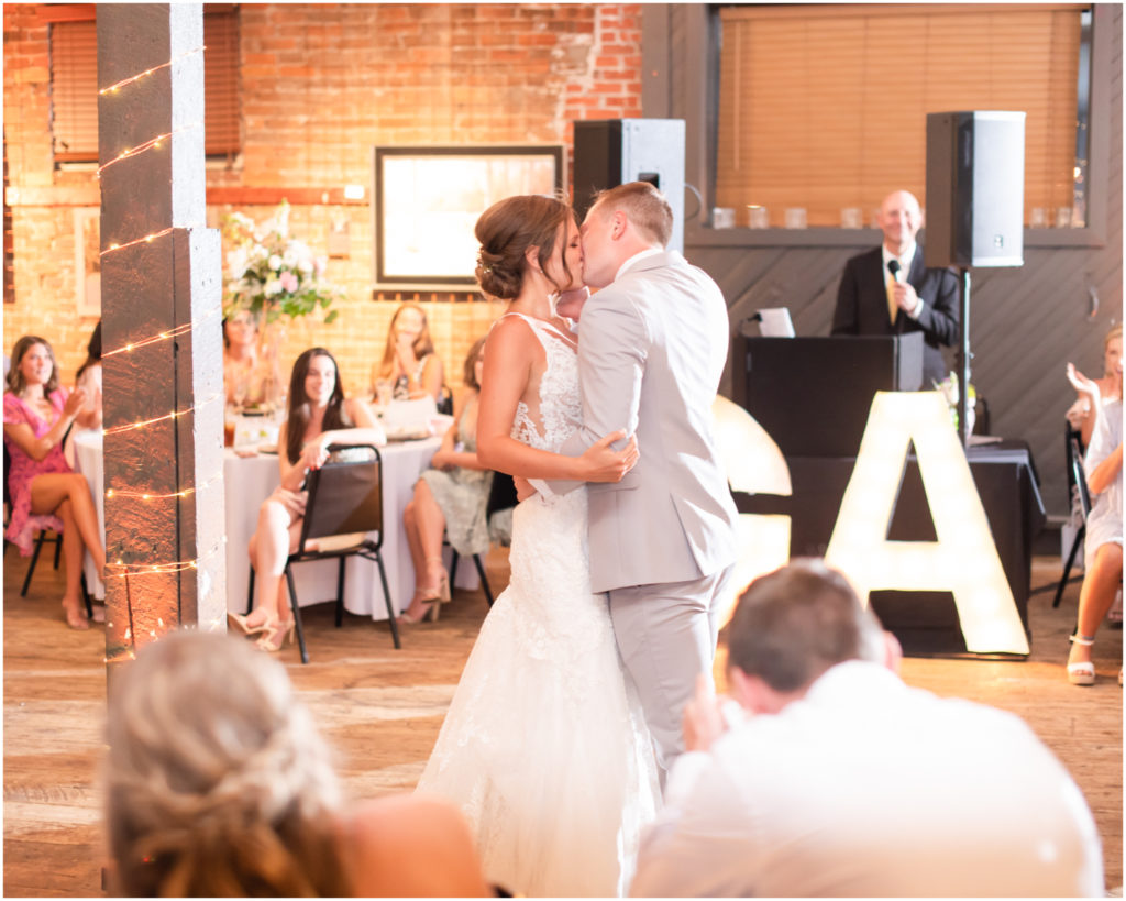 Candlelit Reception at The Warehouse in Colorado Springs | Britni Girard Photography | Colorado Wedding Photo and Video Team | Flowers by A Wildflower Florist | DJ Jay Kacik