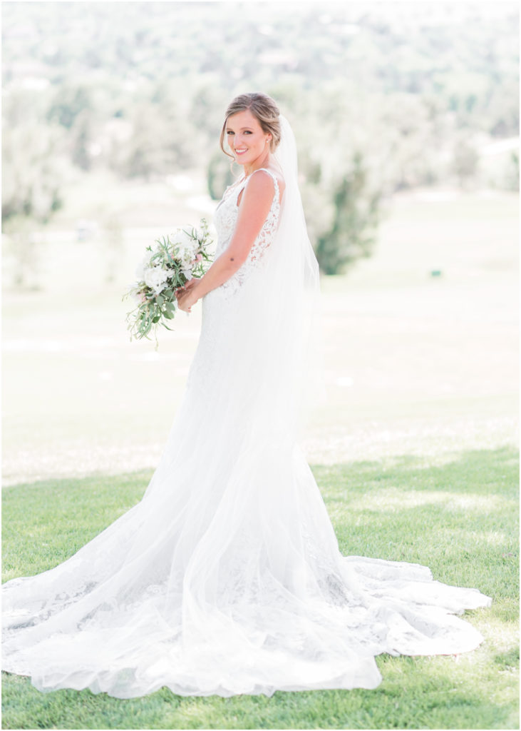 Elegant wedding on the chipping green at Cheyenne Mountain Resort | Britni Girard Photography | Colorado Wedding Photo and Video Team | Bride and Groom | Flowers by A Wildflower Florist | Hair and Makeup by The Day on Location Beauty | Dress from Brickhouse Bridal in Houston | Groom Attire from Generation Tux