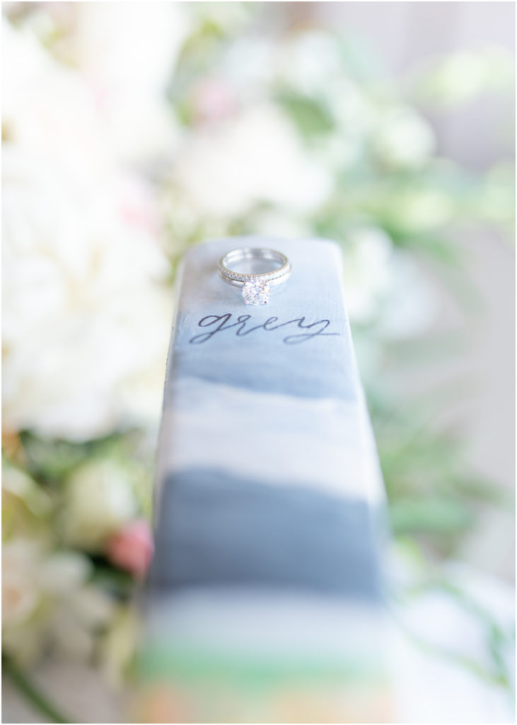 Elegant wedding on the chipping green at Cheyenne Mountain Resort | Britni Girard Photography | Colorado Wedding Photo and Video Team | Bride and Groom | Flowers by A Wildflower Florist | Hair and Makeup by The Day on Location Beauty | Dress from Brickhouse Bridal in Houston | Hand Painted Bible Bride Gift