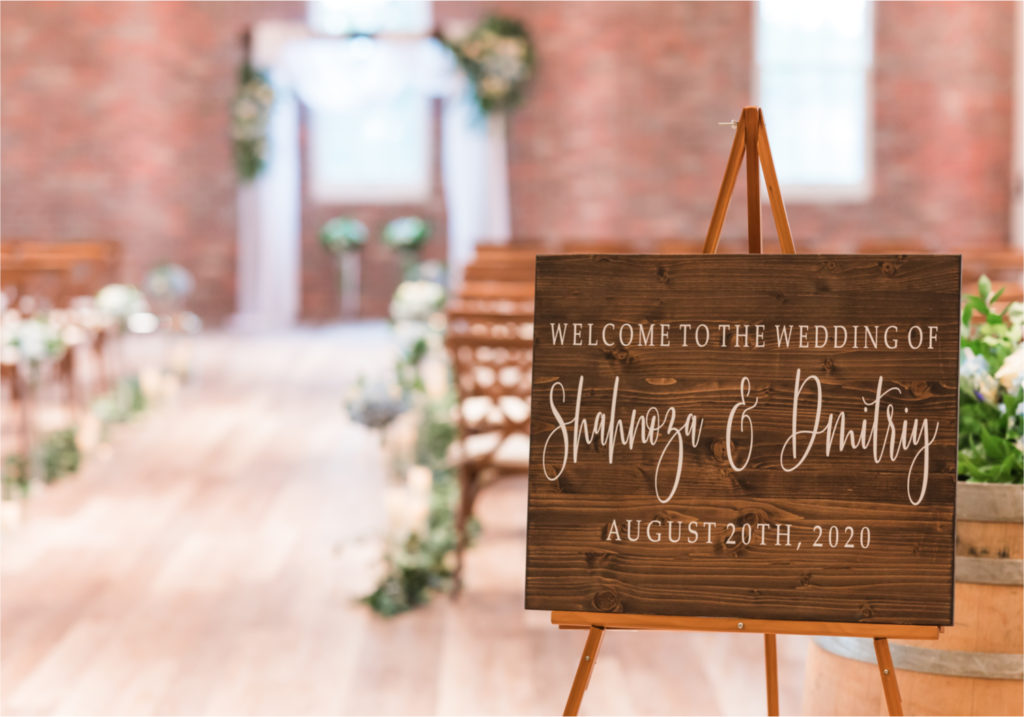 Romantic and Rustic Wedding at The Mill in Windsor | Britni Girard Photography | Colorado based wedding photography and videography team | Indoor Ceremony site with Floral Arch