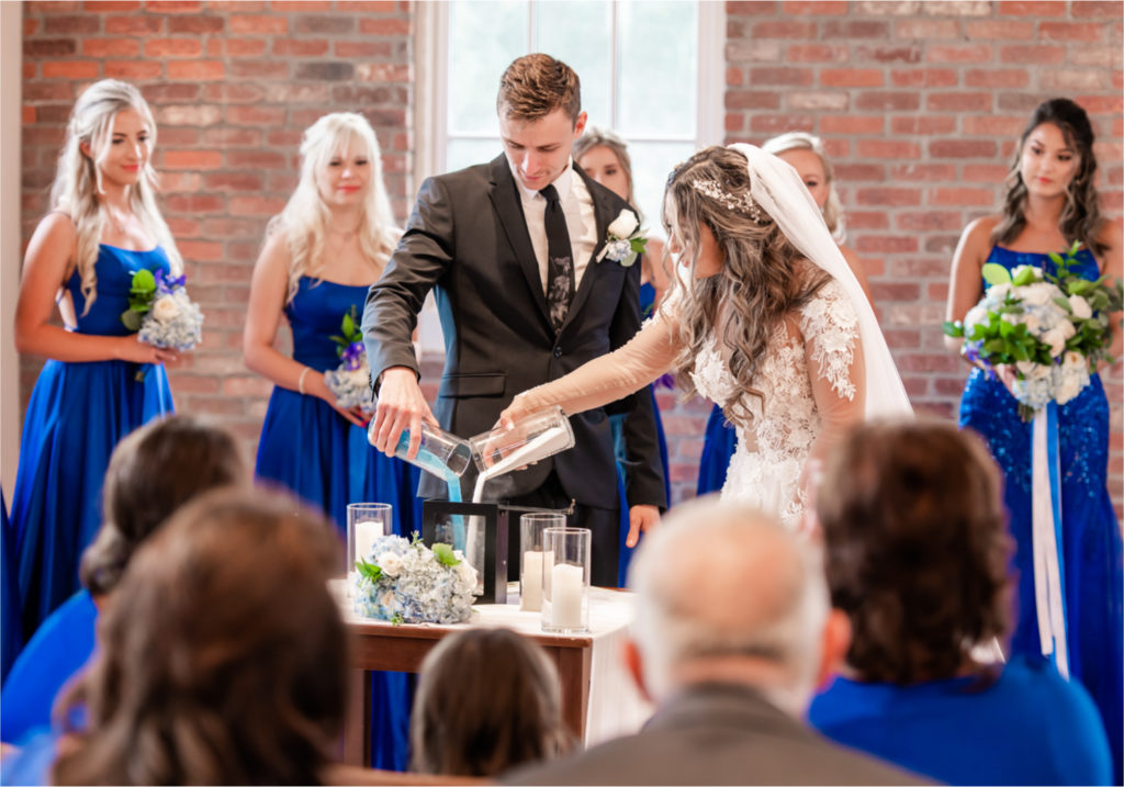 Romantic and Rustic Wedding at The Mill in Windsor | Britni Girard Photography | Colorado based wedding photography and videography team | Unity Ceremony with sand in glass case