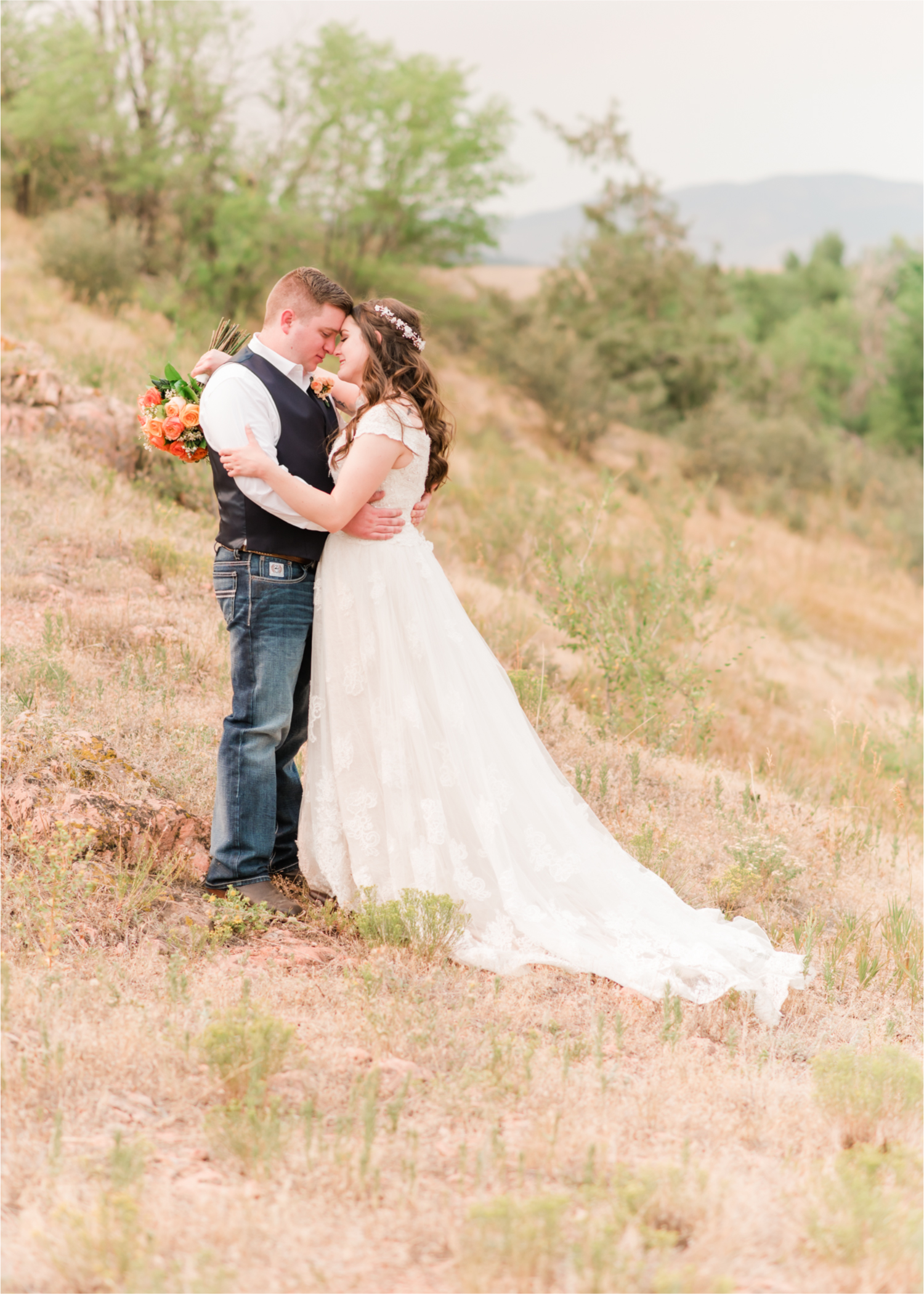 Summer Ellis Ranch Wedding in Loveland Colorado | Britni Girard Photography | Wedding Photo and Video Team | Orange Bouquet | Dessert Hillside