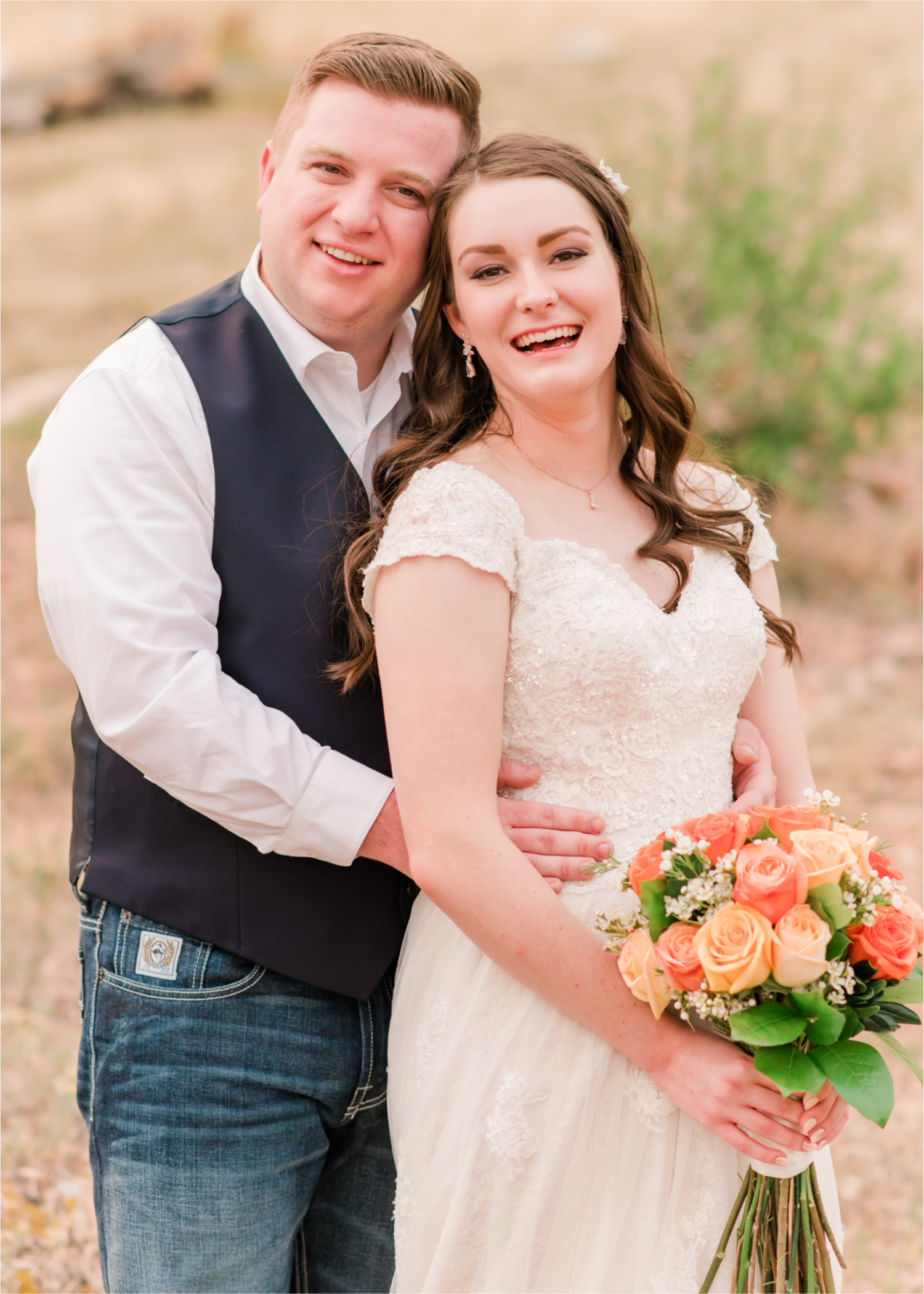 Summer Ellis Ranch Wedding in Loveland Colorado | Britni Girard Photography | Wedding Photo and Video Team | Orange Florals | 