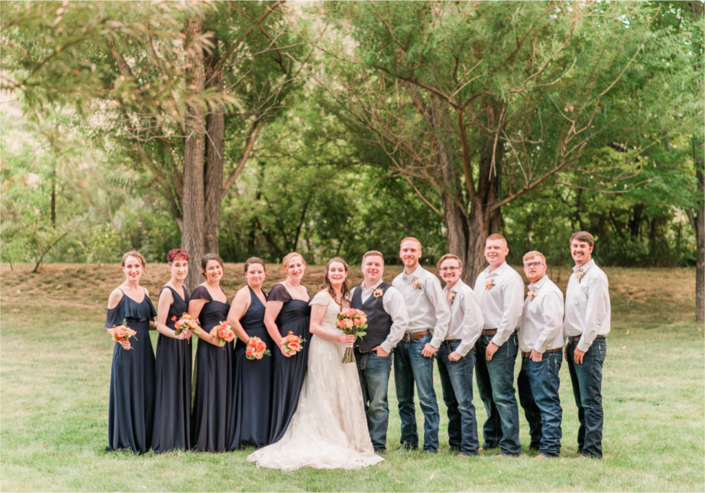Summer Ellis Ranch Wedding in Loveland Colorado | Britni Girard Photography | Wedding Photo and Video Team | Dark Blue and Orange Bridesmaids