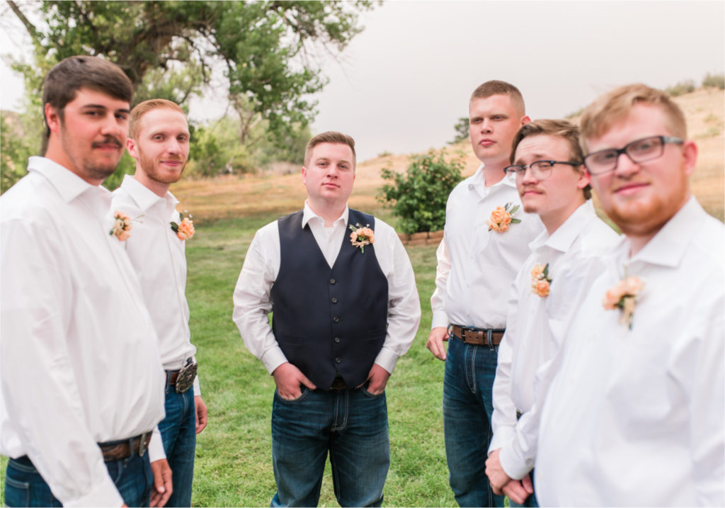 Summer Ellis Ranch Wedding in Loveland Colorado | Britni Girard Photography | Wedding Photo and Video Team | Jeans and cowboy boots groomsmen