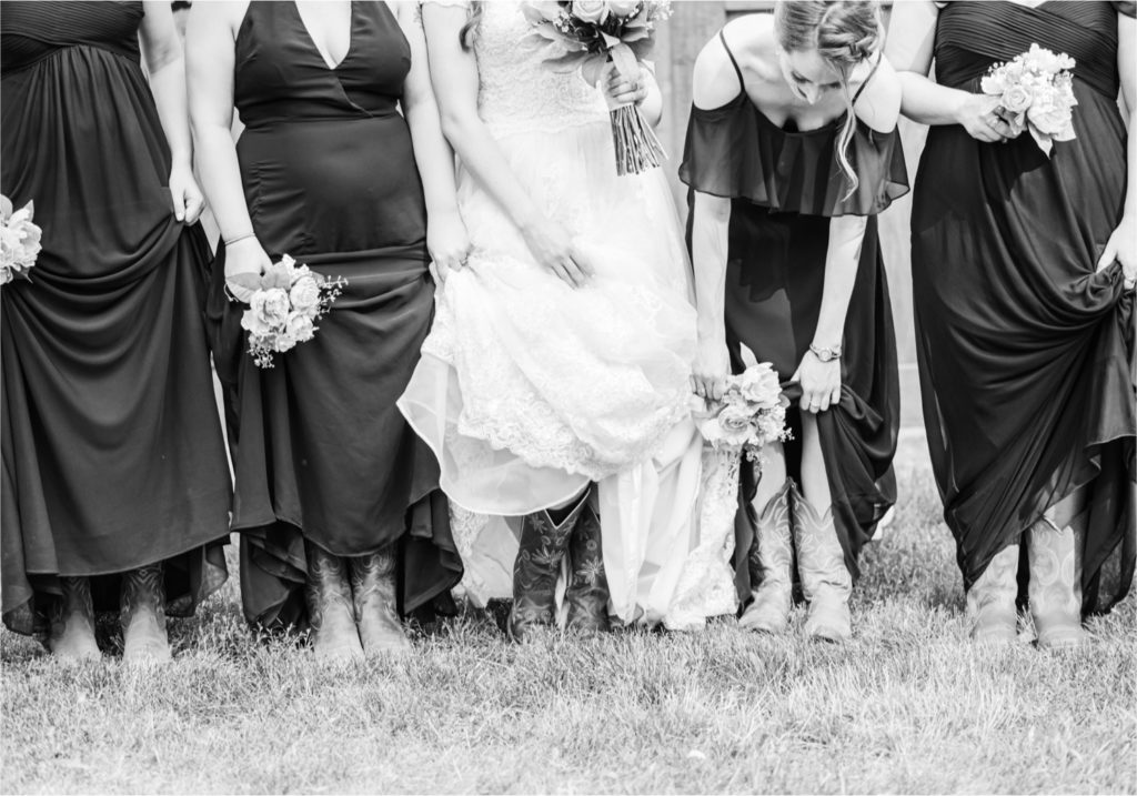 Summer Ellis Ranch Wedding in Loveland Colorado | Britni Girard Photography | Wedding Photo and Video Team | Dark Blue and Orange Bridesmaids - boots