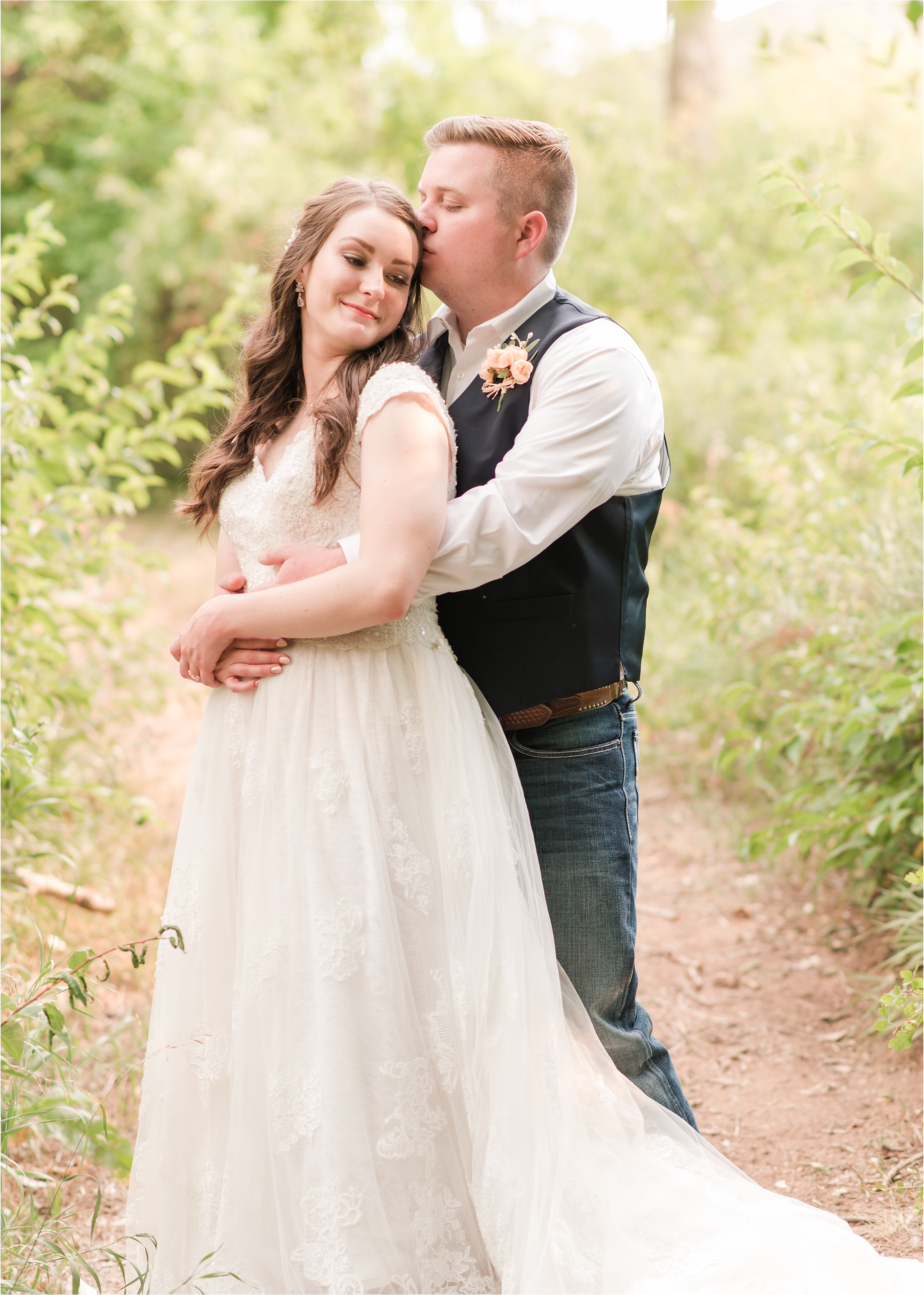 Summer Ellis Ranch Wedding in Loveland Colorado | Britni Girard Photography | Wedding Photo and Video Team | Bride and Groom Just Married Walk in Forrest