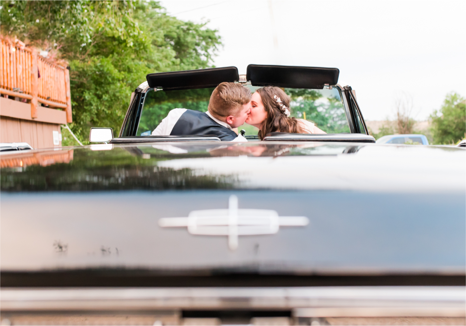 Summer Ellis Ranch Wedding in Loveland Colorado | Britni Girard Photography | Wedding Photo and Video Team | Classic Car Exit