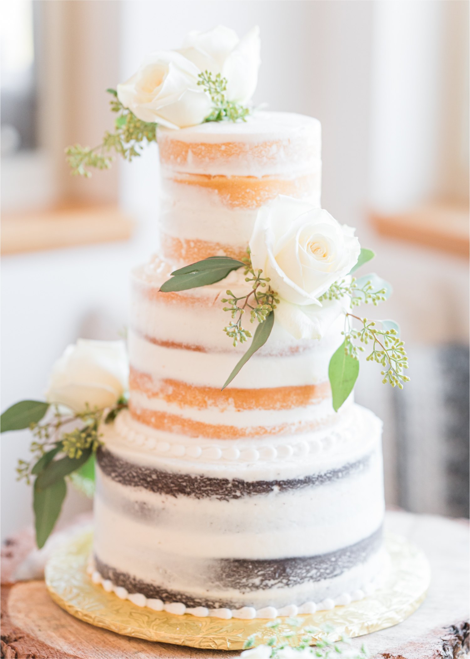 Autumn mountain wedding in Florence Colorado | Britni Girard Photography | Colorado Wedding Photo and Video Team | Mountainside Cabin for intimate wedding with rustic farm-tables and romantic details | 3 tiered rustic cake by Sugar Plum Cake Shoppe