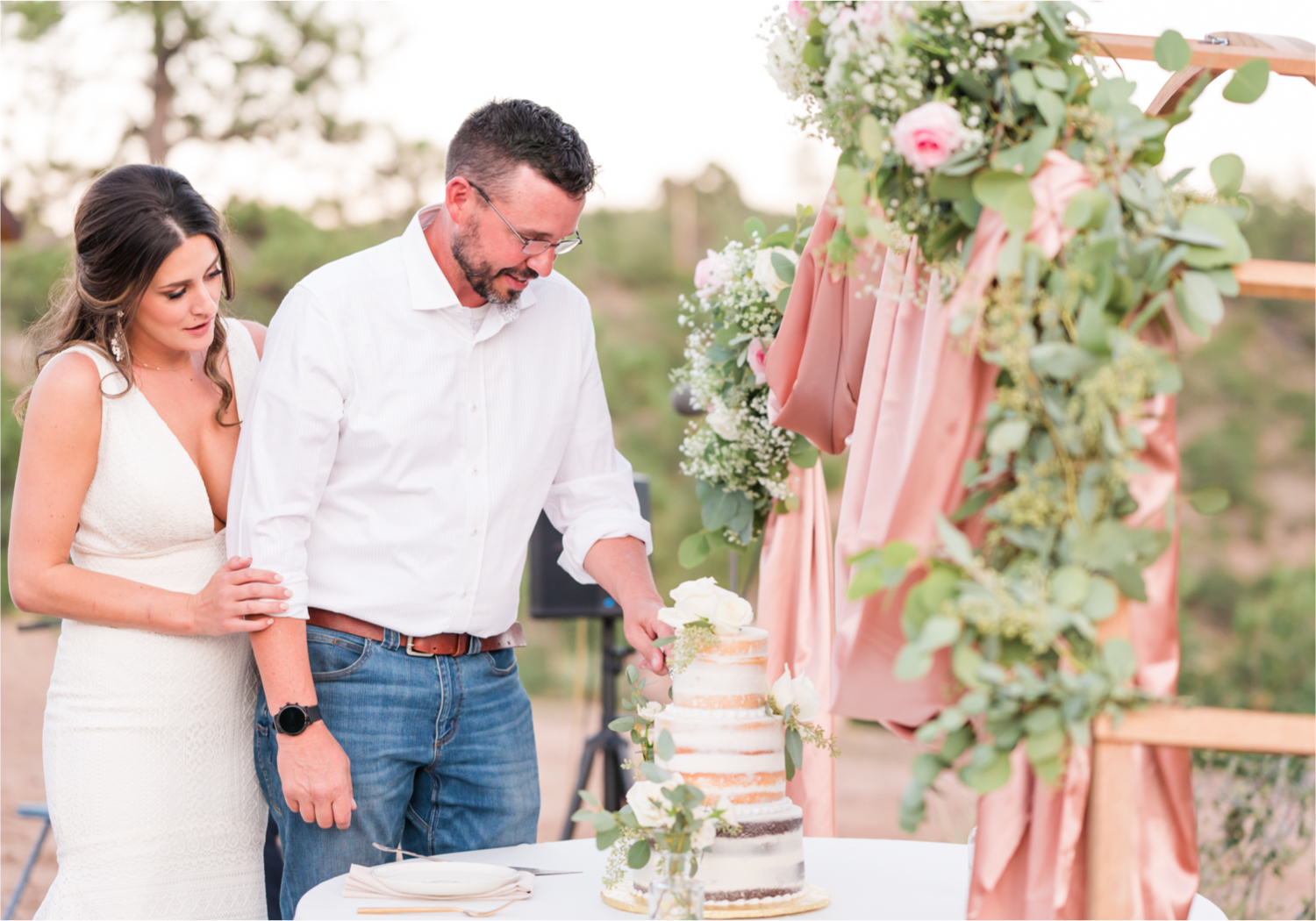 Autumn mountain wedding in Florence Colorado | Britni Girard Photography | Colorado Wedding Photo and Video Team | Mountainside Cabin for intimate wedding with rustic farm-tables and romantic details | 3 tiered cake by Sugar Plum Cake Shoppe White, Dusty Rose and Sage