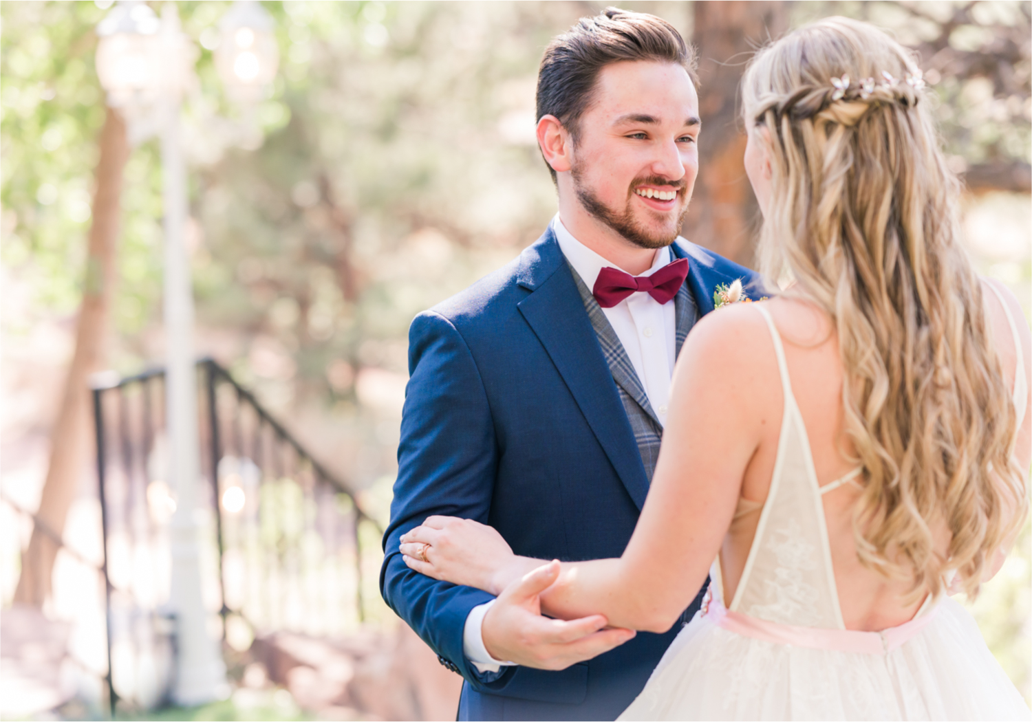 Romantic Whimsical Wedding at the Lionscrest Manor in Lyons, CO | Britni Girard Photography - Wedding Photo and Video Team | Rustic Fall Decor mixed in Burgundy, Blush, Gold and Sage | Groom in Custom Suit from Jos. a Banks | First Look in the garden