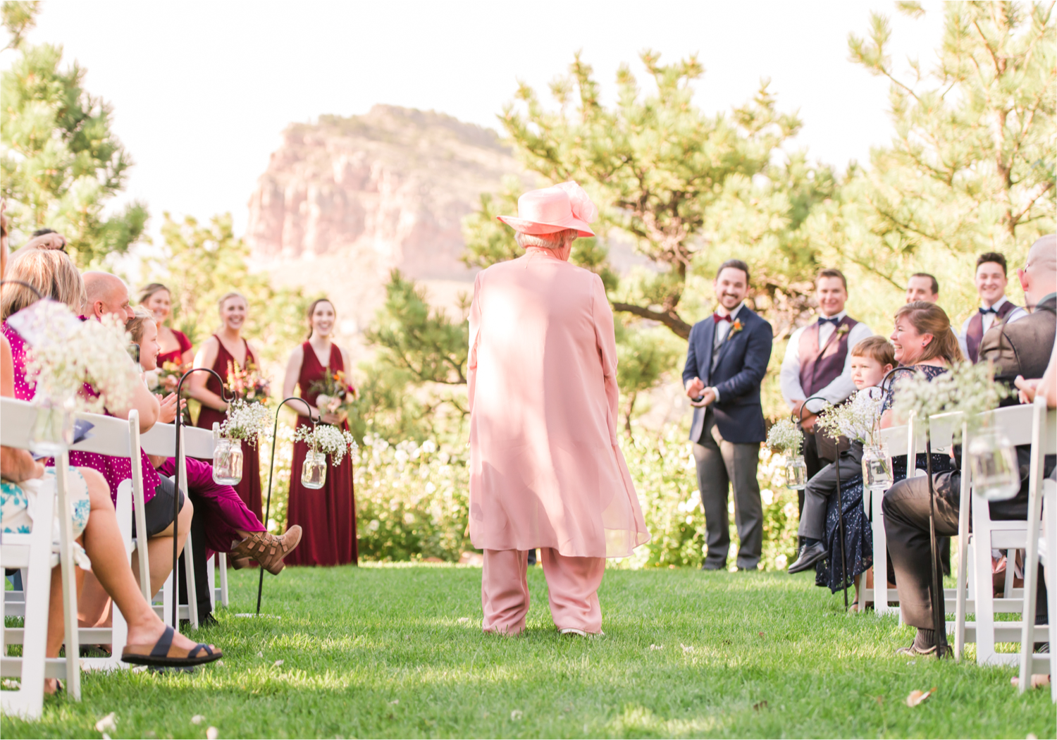Romantic Whimsical Wedding at the Lionscrest Manor in Lyons, CO | Britni Girard Photography - Wedding Photo and Video Team | Rustic Fall Decor mixed in Burgundy, Blush, Gold and Sage | Wedding Dress from Anna Be Bridal by Hailey Paige | Hair and Makeup by Glam 5280 Chaundra Revier | Florals by Aflorae | Ceremony Site overlooking the Rocky Mountains | Mountaintop Ceremony | Grandma flowergirl | Flowergirl Alternatives