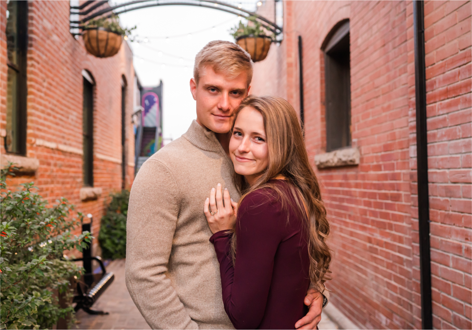 Fall Engagement in Old Town Fort Collins | Britni Girard Photography | Colorado Wedding Photography and Videography | Husband and Wife Team | Wandering the alley's and old town square with twinkle lights all around