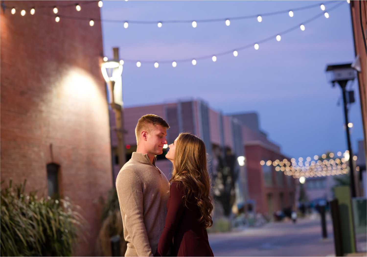Fall Engagement in Old Town Fort Collins | Britni Girard Photography | Colorado Wedding Photography and Videography | Husband and Wife Team | Wandering the alley's and old town square with twinkle lights all around