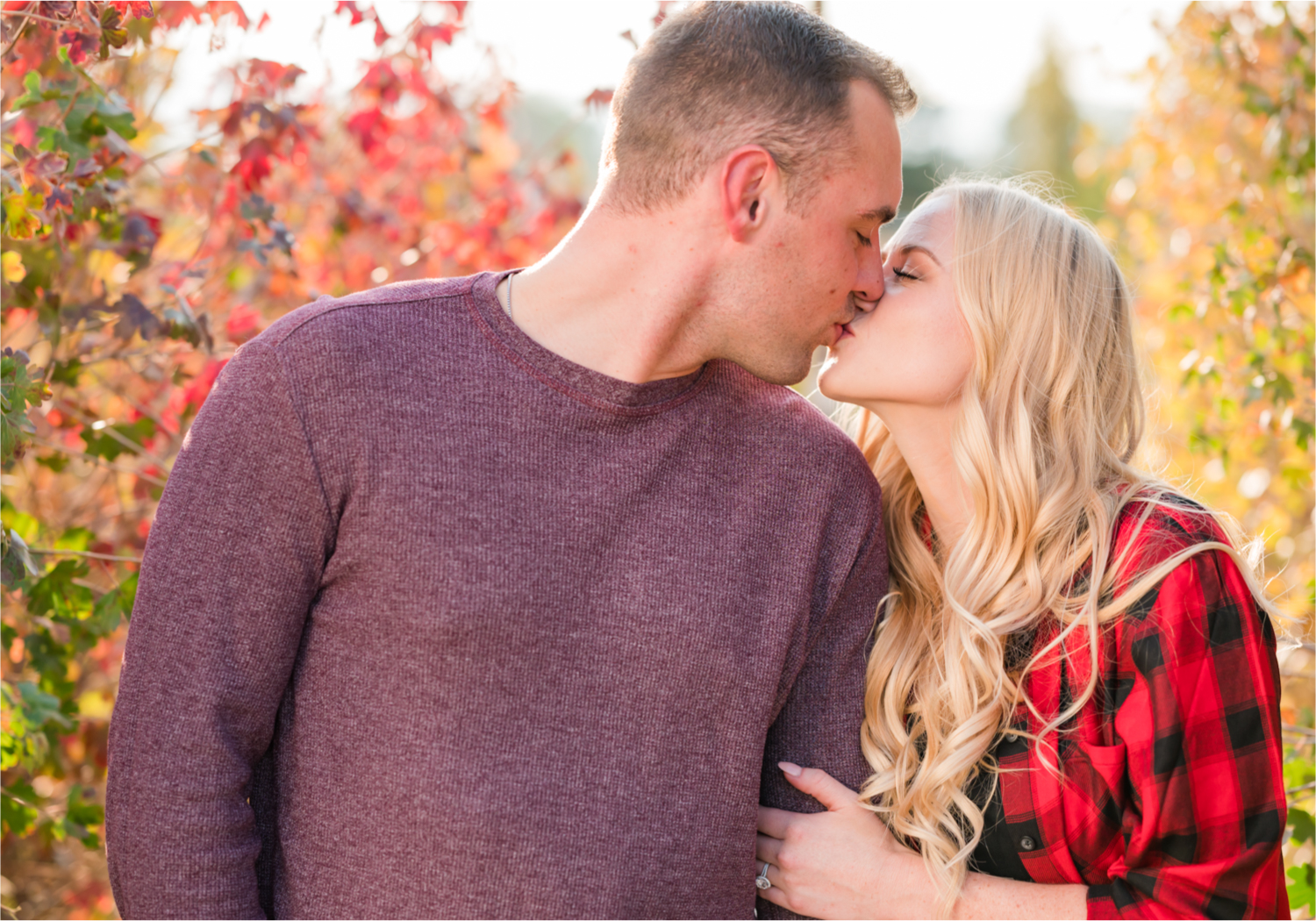 Romantic Fall Farmhouse Engagement at Jessup Farm | Britni Girard Photography | Colorado Wedding Photographer and Videography team | Rustic fences, fall leaves and barn doors in Fort Collins