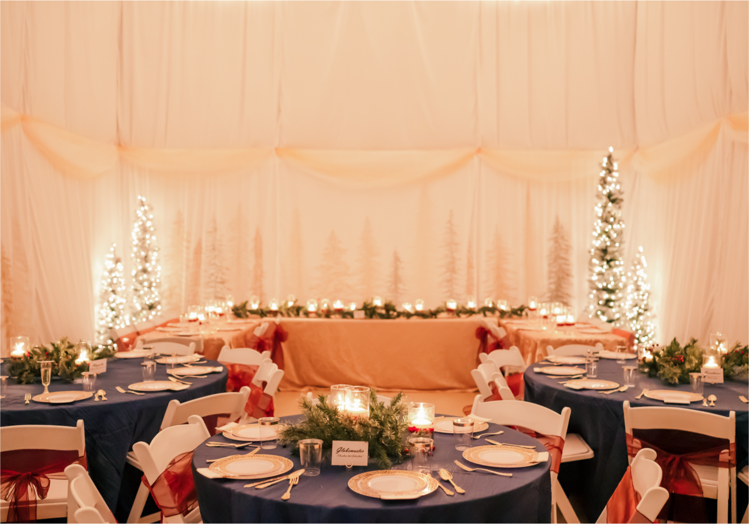 Winter Wonderland Wedding in Colorado Springs | Britni Girard Photography Colorado Wedding Photography and Film Team | Snow covered mountains and Christmas just a few days away | Annika + John's Nostalgic Winter Wedding | Bride's Dress iDream Bridal Essence of Australia | Air Force Academy | Reception with hand-painted mountain backdrops, candelight and Christmas trees.  Burgundy, Navy and Gold