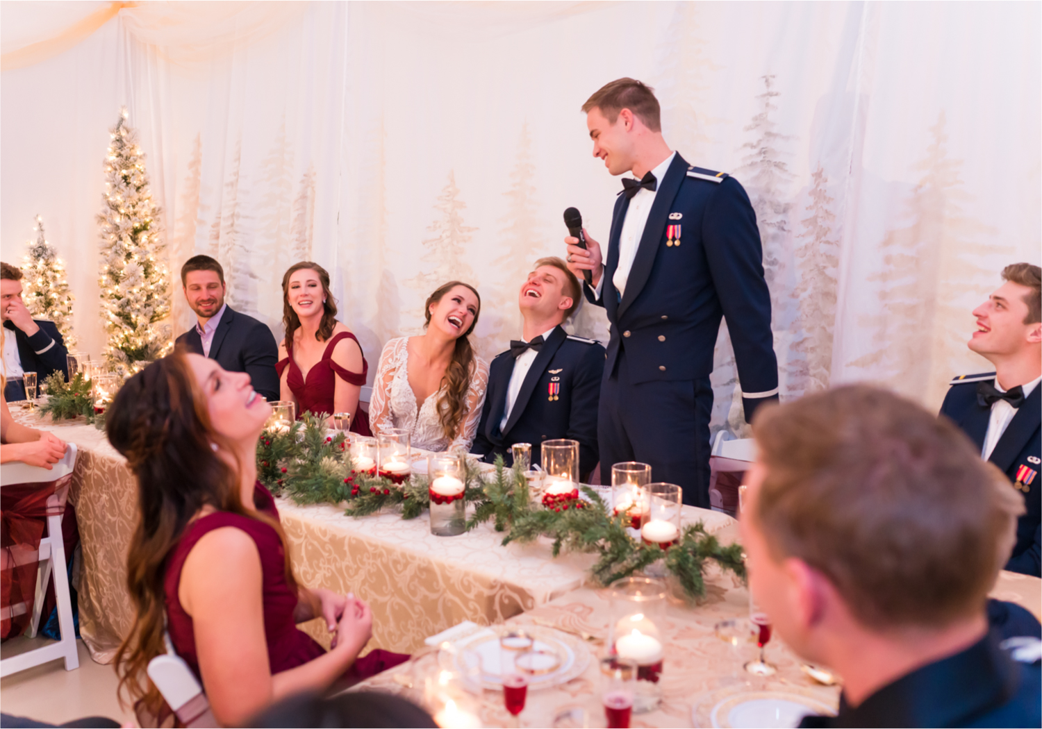 Winter Wonderland Wedding in Colorado Springs | Britni Girard Photography Colorado Wedding Photography and Film Team | Snow covered mountains and Christmas just a few days away | Annika + John's Nostalgic Winter Wedding | Bride's Dress iDream Bridal Essence of Australia | Air Force Academy | Reception with hand-painted mountain backdrops, candelight and Christmas trees.  Burgundy, Navy and Gold
