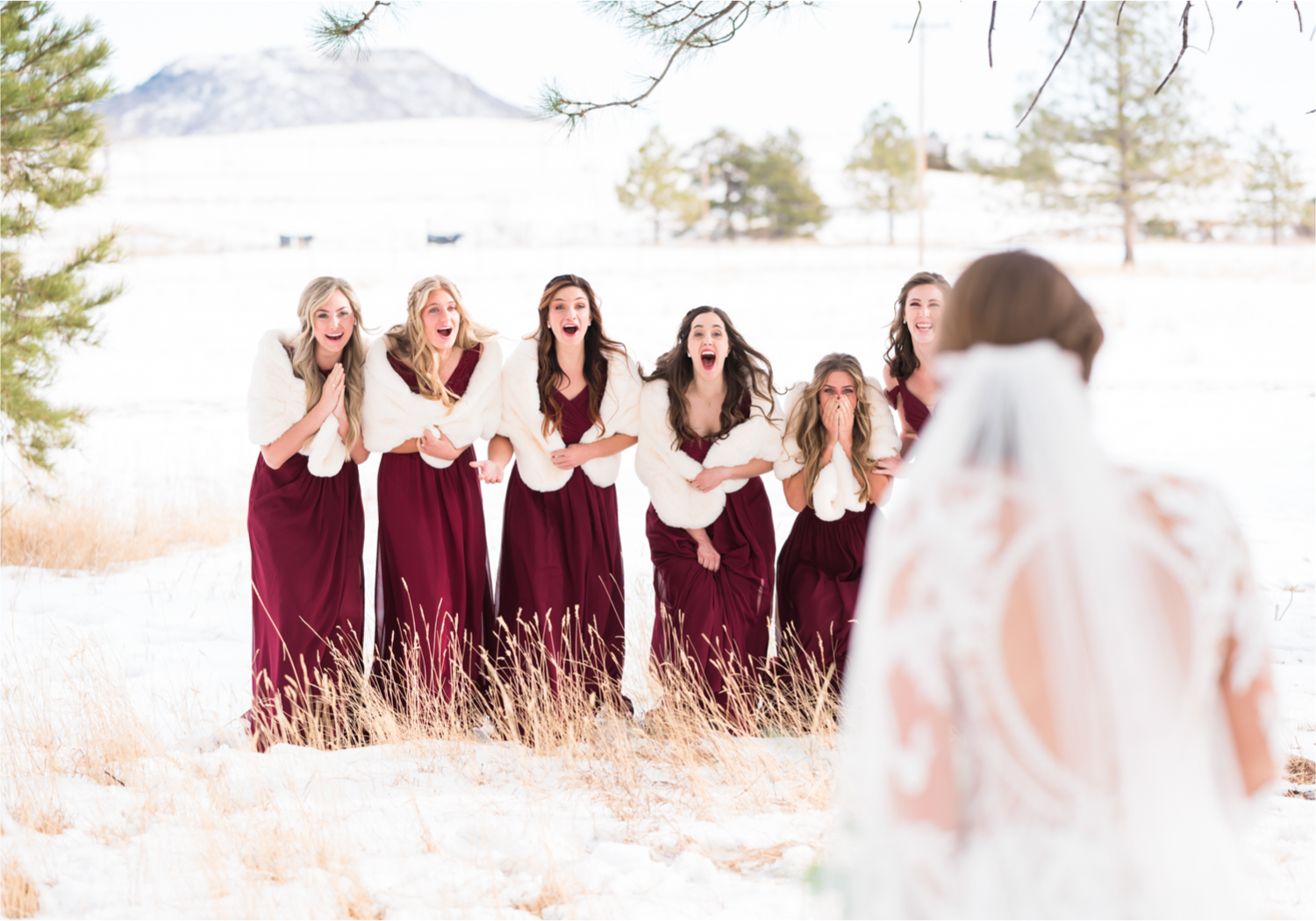 Winter Wonderland Wedding in Colorado Springs | Britni Girard Photography Colorado Wedding Photography and Film Team | Snow covered mountains and Christmas just a few days away | Annika + John's Nostalgic Winter Wedding | Bride's Dress iDream Bridal Essence of Australia | Air Force Academy | Bridesmaid First Look | Bridesmaid Dresses by Azazie