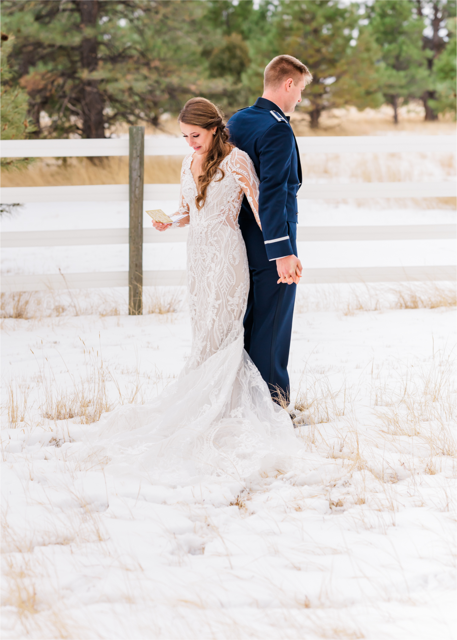 Winter Wonderland Wedding in Colorado Springs | Britni Girard Photography Colorado Wedding Photography and Film Team | Snow covered mountains and Christmas just a few days away | Annika + John's Nostalgic Winter Wedding | Bride's Dress iDream Bridal Essence of Australia | Air Force Academy | First Look in Snow and Bride and Groom Letters back to back