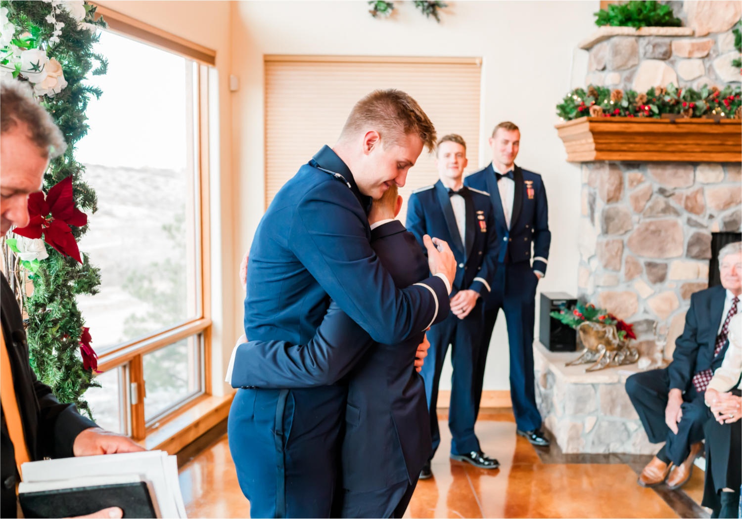 Winter Wonderland Wedding in Colorado Springs | Britni Girard Photography Colorado Wedding Photography and Film Team | Snow covered mountains and Christmas just a few days away | Annika + John's Nostalgic Winter Wedding | Bride's Dress iDream Bridal Essence of Australia | Air Force Academy | Ceremony Entrance Rustic Cabin 