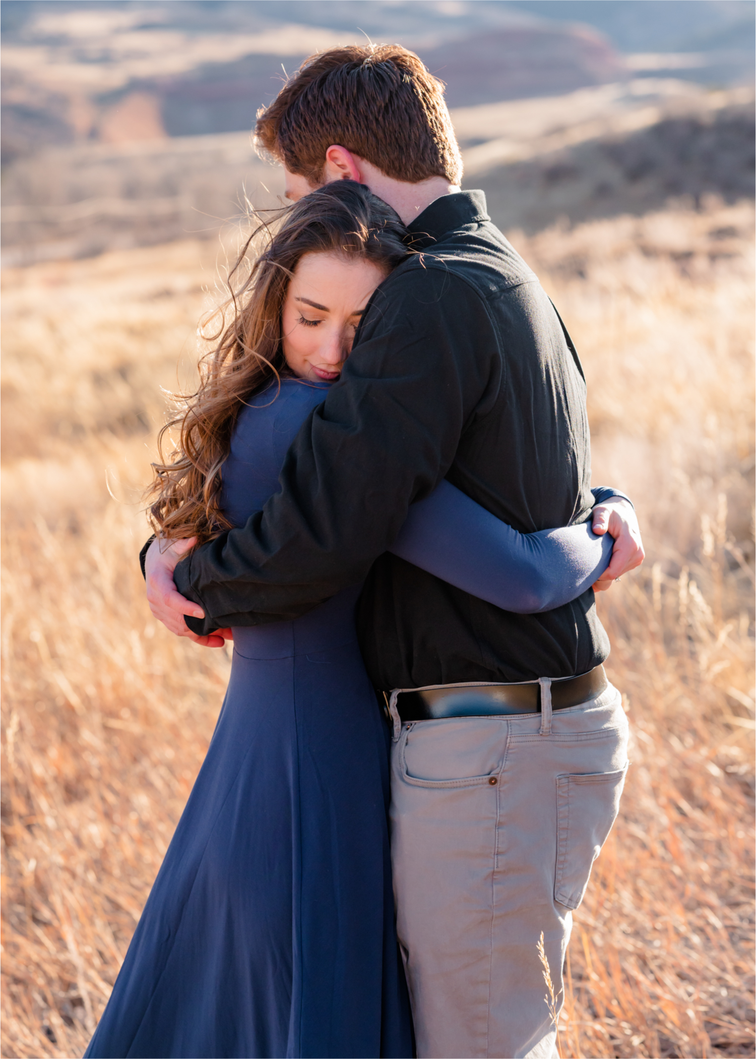Rocky Mountain Winter Engagement in Colorado | Britni Girard Photography | Husband and Wife Photography and Cinematography Team | Winter Coats and hikes along hall ranch in Lyons, CO | Silly and Romantic