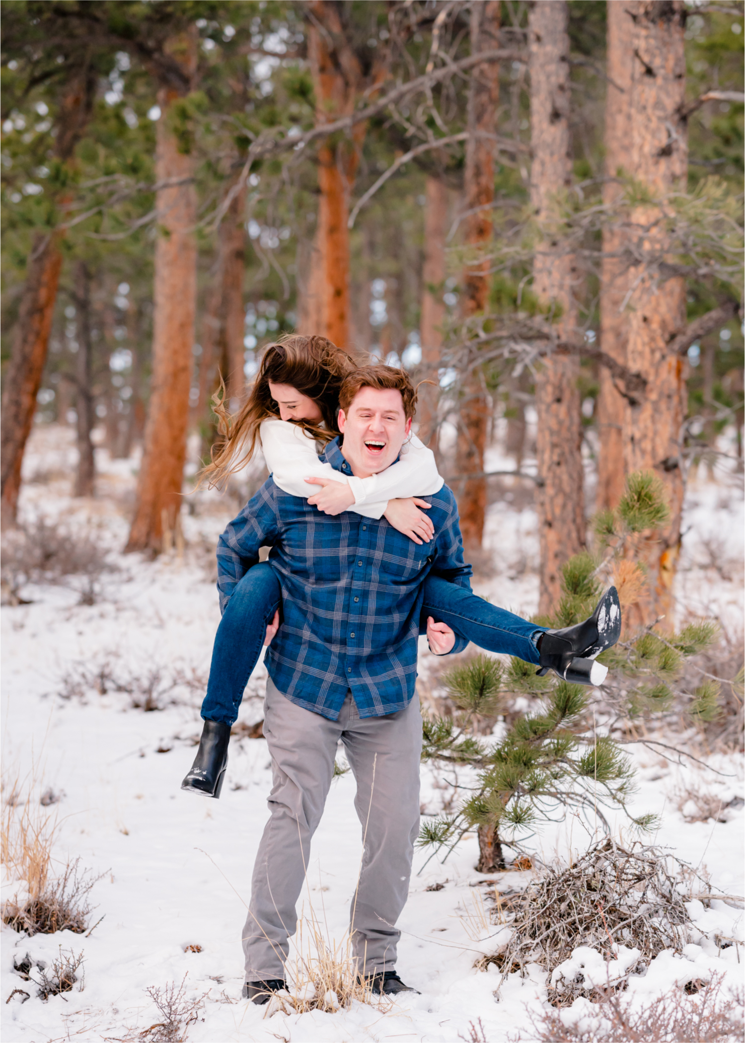 Rocky Mountain Winter Engagement in Colorado | Britni Girard Photography | Husband and Wife Photography and Cinematography Team | A snowy overlook in Roosevelt National Park
