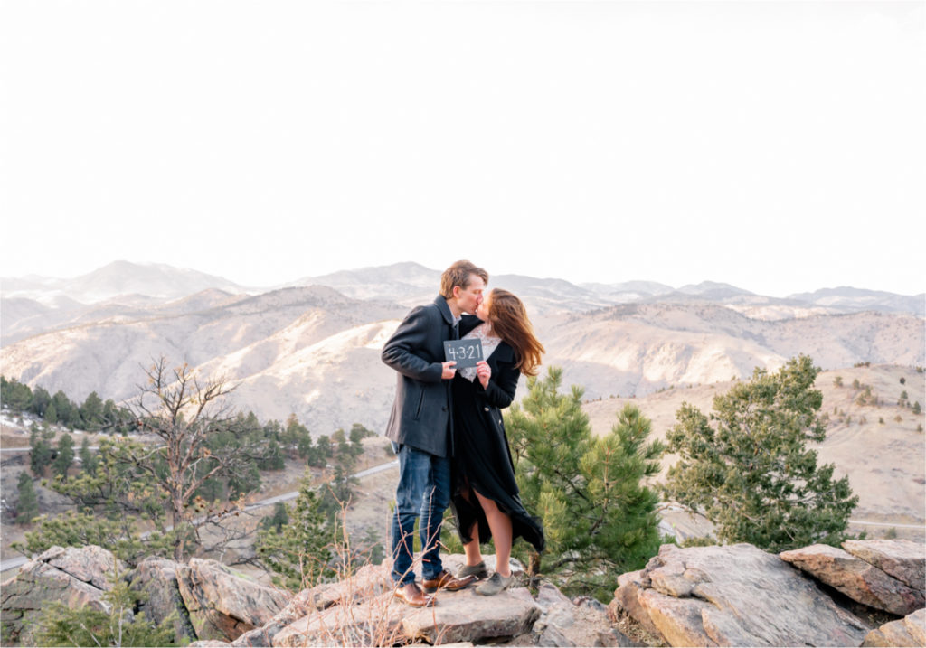 Winter Engagement on Lookout Mountain in Golden Colorado | Britni Girard Photography | Destination Photo and Video Team | Epic views of Golden, dreamy sunsets, dancing and snuggles.  Save the Date on a mountain top.