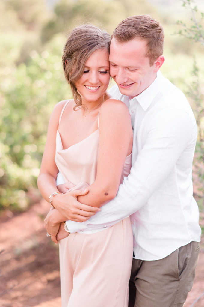 Satin Blush Jumpsuit for engagement outfit inspiration | Britni Girard Photography - Colorado Wedding Photographer and Video Team | Colorado Springs Garden of the Gods engagement photographer