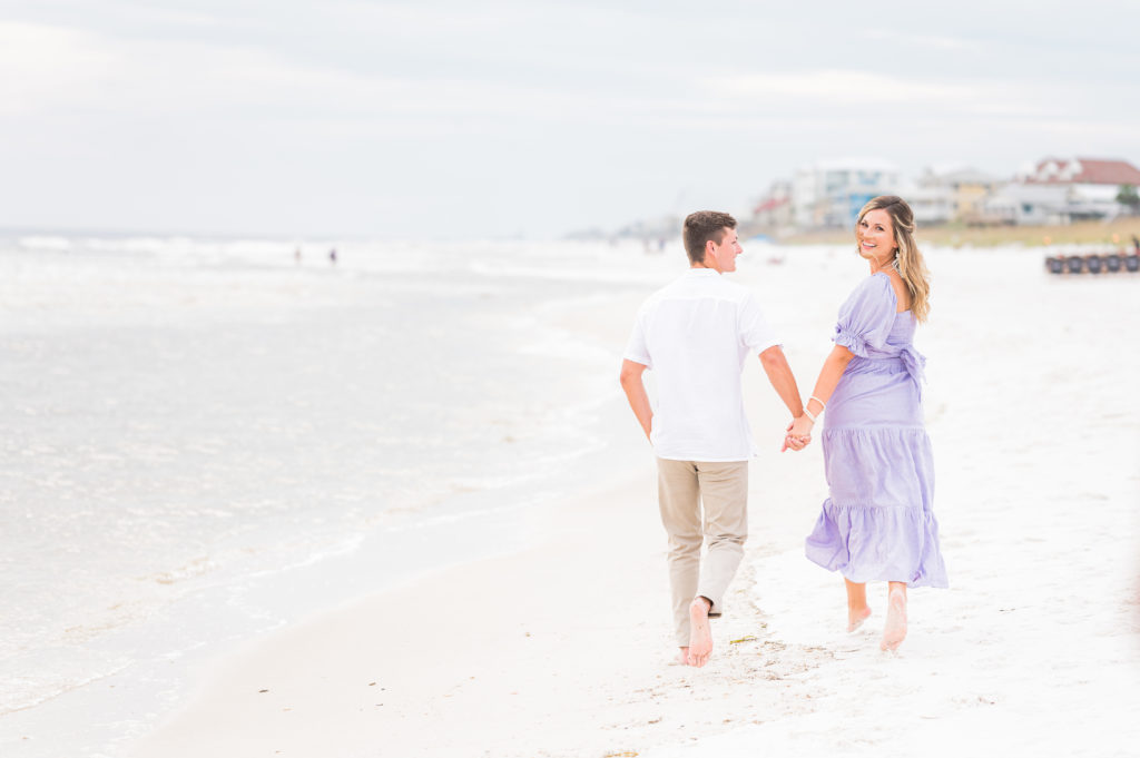 Beach Engagement outfits in 30a at rosemary beach | Britni Girard Photography - Destination Wedding and engagement Photographer and Video Team | Lilac dress on beach for engagement session in Florida